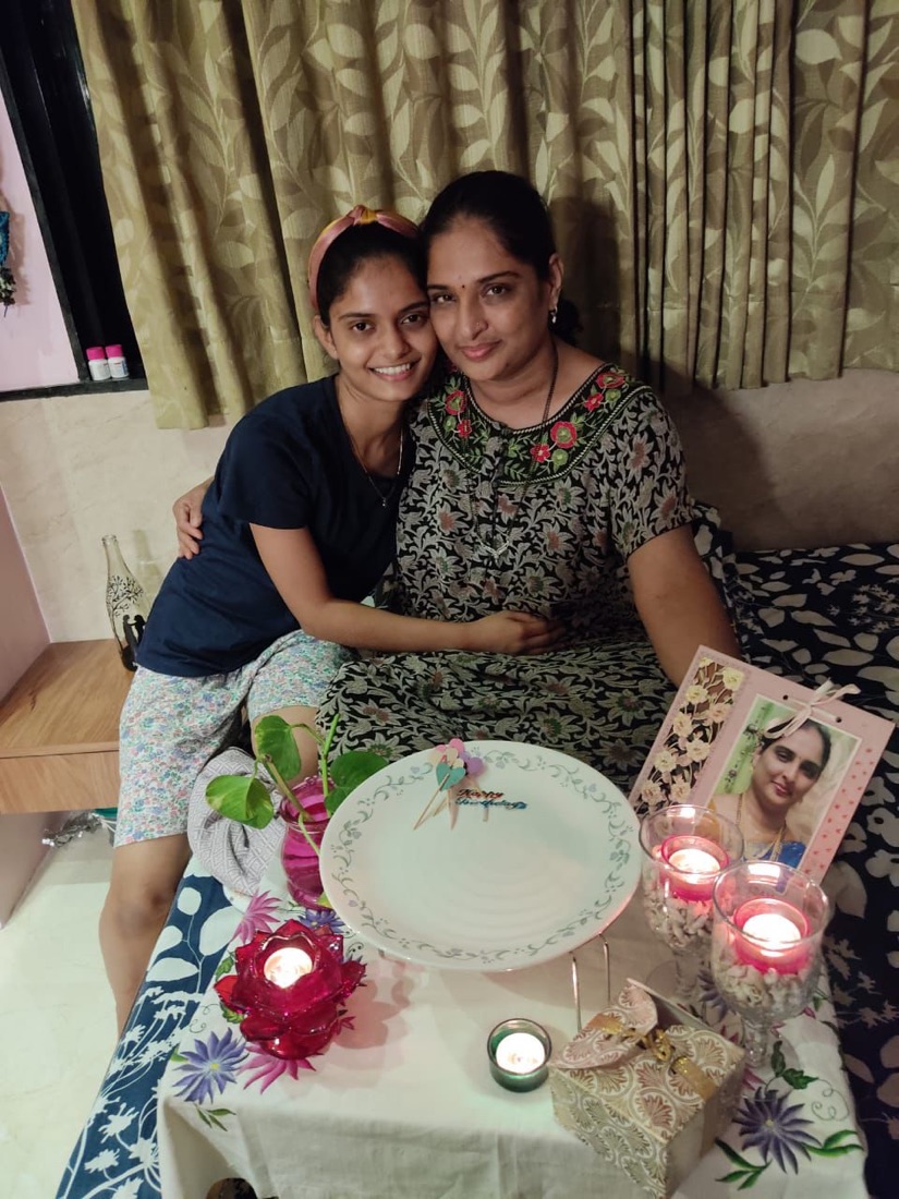 Shrushti hugging her mother